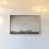 Timeless Monument Valley by Nathan Larson. shown as a paper print in a white frame. Available as a archival giclee rolled canvas, fine art paper, or poster print. SKU 87106i.