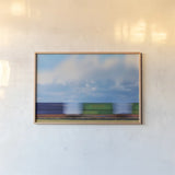 Train Dreams by Nathan Larson. shown as a paper print in a natural frame. Available as a archival giclee rolled canvas, fine art paper, or poster print. SKU 103383i.
