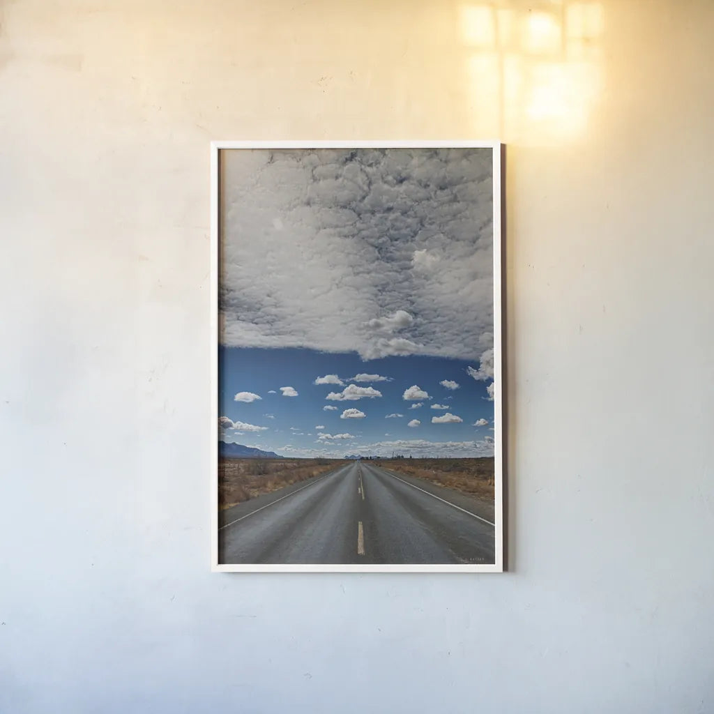 Tres Hermanas Clouds Color by Nathan Larson. shown as a paper print in a white frame. Available as a archival giclee rolled canvas, fine art paper, or poster print. SKU 77277h.