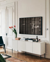 Trinity I BW by Nathan Larson. shown as a framed stretched canvas in a living room above a console. Available as a archival giclee rolled canvas, fine art paper, or poster print. SKU 101213i.