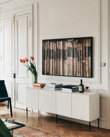Trinity III by Nathan Larson. shown as a framed stretched canvas in a living room above a console. Available as a archival giclee rolled canvas, fine art paper, or poster print. SKU 101216i.