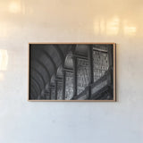 Trinity Library Design BW by Nathan Larson. shown as a paper print in a natural frame. Available as a archival giclee rolled canvas, fine art paper, or poster print. SKU 103688i.
