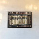 Trinity Library II by Nathan Larson. shown as a paper print in a black flame. Available as a archival giclee rolled canvas, fine art paper, or poster print. SKU 103686i.