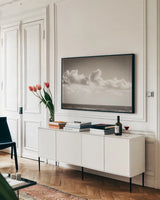 Venice Beach BW by Nathan Larson. shown as a framed stretched canvas in a living room above a console. Available as a archival giclee rolled canvas, fine art paper, or poster print. SKU 90444i.