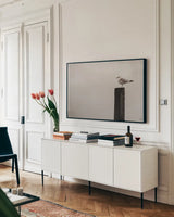 Watching the rain Fall by Nathan Larson. shown as a framed stretched canvas in a living room above a console. Available as a archival giclee rolled canvas, fine art paper, or poster print. SKU 97448i.