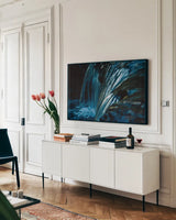 Water Light I by Nathan Larson. shown as a framed stretched canvas in a living room above a console. Available as a archival giclee rolled canvas, fine art paper, or poster print. SKU 103792i.