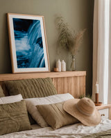 Water Light II by Nathan Larson. shown as a paper print in a natural frame. Available as a archival giclee rolled canvas, fine art paper, or poster print. SKU 103794h.