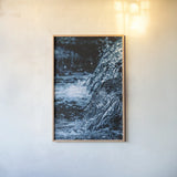 Water Light III by Nathan Larson. shown as a paper print in a natural frame. Available as a archival giclee rolled canvas, fine art paper, or poster print. SKU 103796h.
