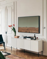 Welcome II by Nathan Larson. shown as a framed stretched canvas in a living room above a console. Available as a archival giclee rolled canvas, fine art paper, or poster print. SKU 82426i.