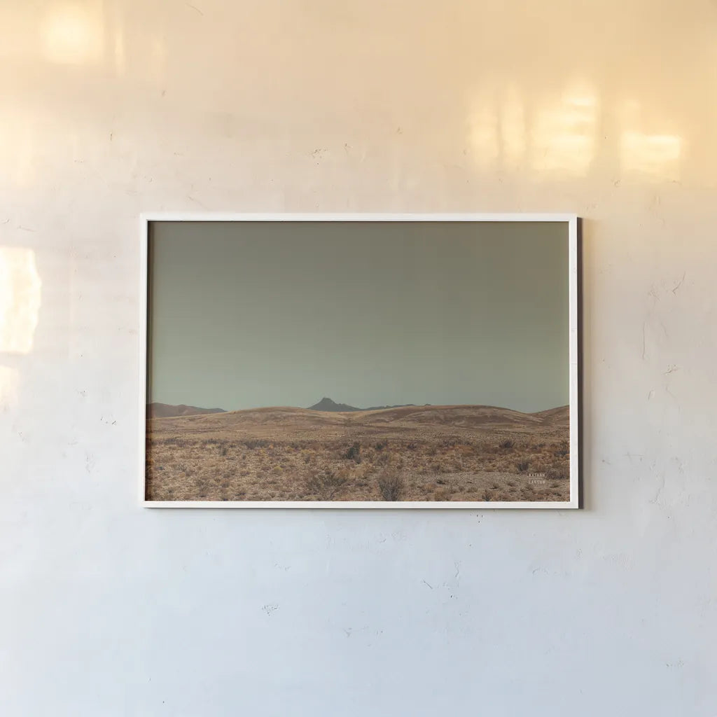 Welcome II by Nathan Larson. shown as a paper print in a white frame. Available as a archival giclee rolled canvas, fine art paper, or poster print. SKU 82426i.