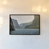 Western Brook Pond by Nathan Larson. shown as a paper print in a black flame. Available as a archival giclee rolled canvas, fine art paper, or poster print. SKU 101660i.