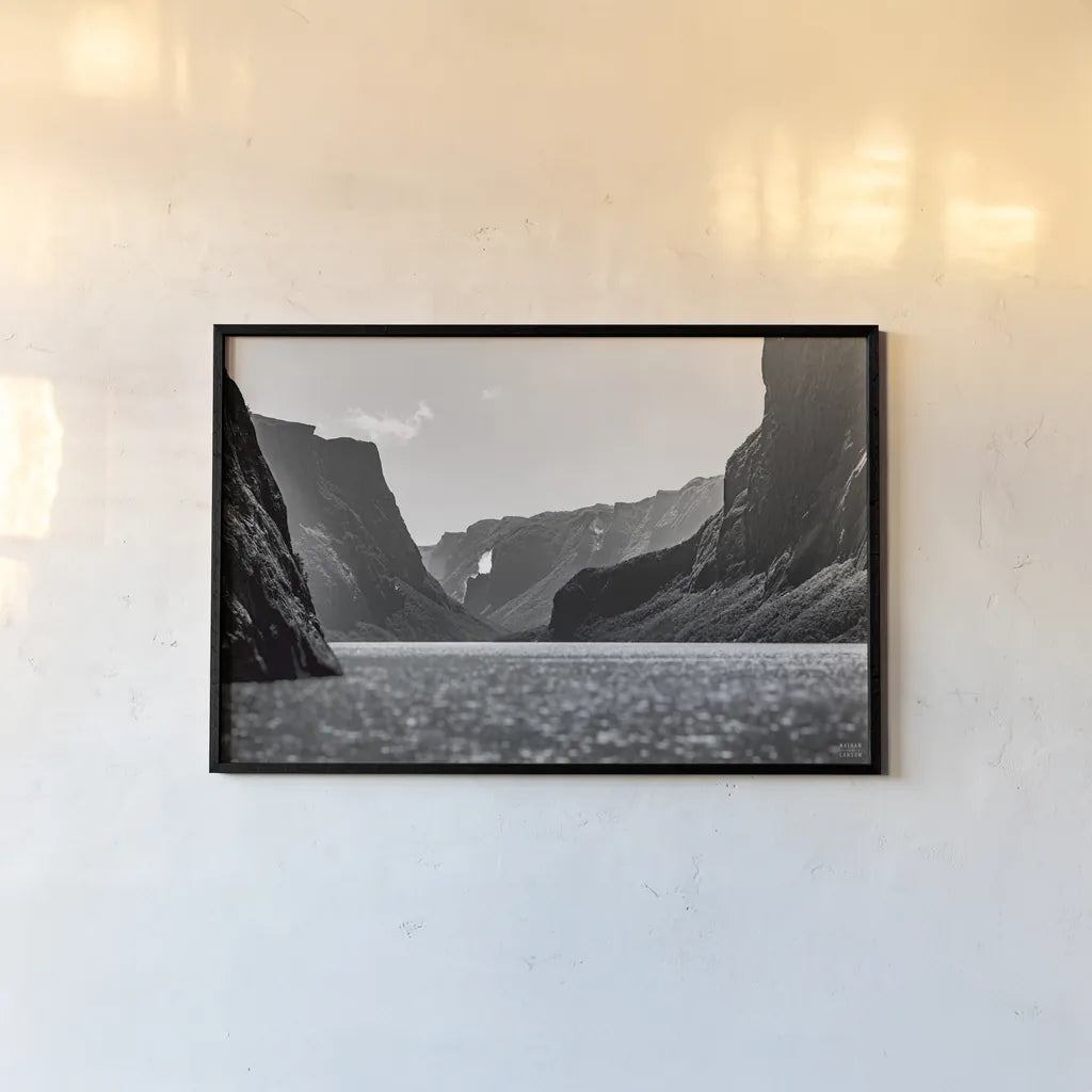 Western Brook Pond BW by Nathan Larson. shown as a paper print in a black flame. Available as a archival giclee rolled canvas, fine art paper, or poster print. SKU 101662i.