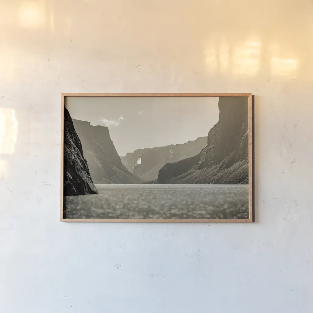 Western Brook Pond Sepia by Nathan Larson. shown as a paper print in a natural frame. Available as a archival giclee rolled canvas, fine art paper, or poster print. SKU 101661i.