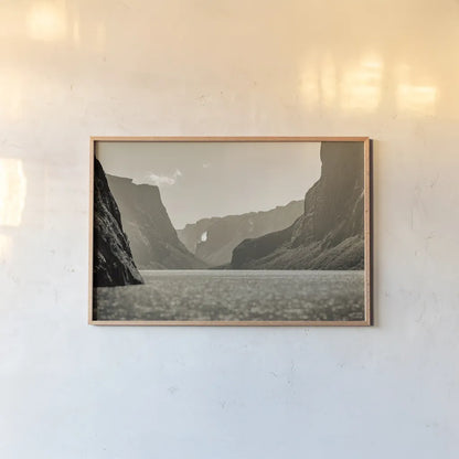 Western Brook Pond Sepia by Nathan Larson. shown as a paper print in a natural frame. Available as a archival giclee rolled canvas, fine art paper, or poster print. SKU 101661i.