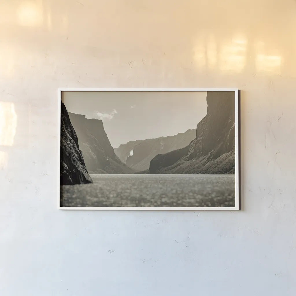 Western Brook Pond Sepia by Nathan Larson. shown as a paper print in a white frame. Available as a archival giclee rolled canvas, fine art paper, or poster print. SKU 101661i.