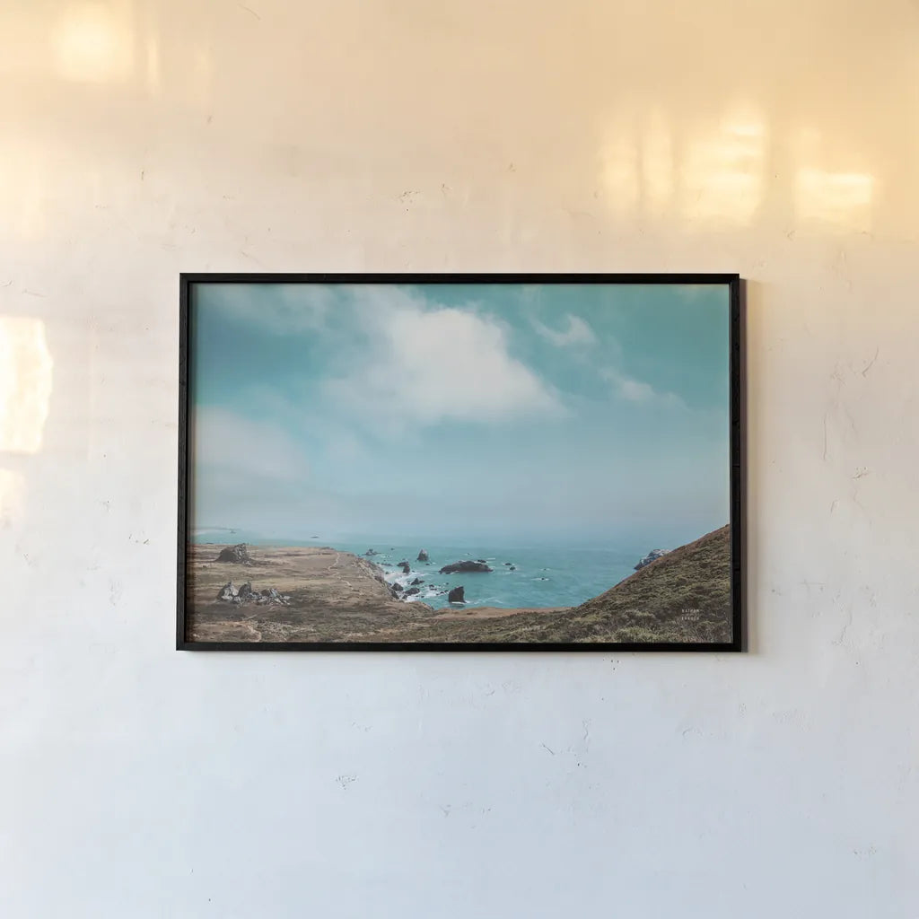 When Sea Becomes Sky by Nathan Larson. shown as a paper print in a black flame. Available as a archival giclee rolled canvas, fine art paper, or poster print. SKU 88868i.