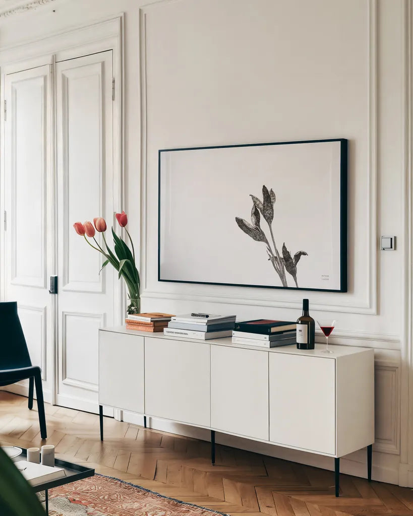 Winter Rebirth by Nathan Larson. shown as a framed stretched canvas in a living room above a console. Available as a archival giclee rolled canvas, fine art paper, or poster print. SKU 82304i.