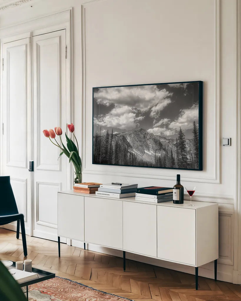 Wyoming Blues by Nathan Larson. shown as a framed stretched canvas in a living room above a console. Available as a archival giclee rolled canvas, fine art paper, or poster print. SKU 81751i.