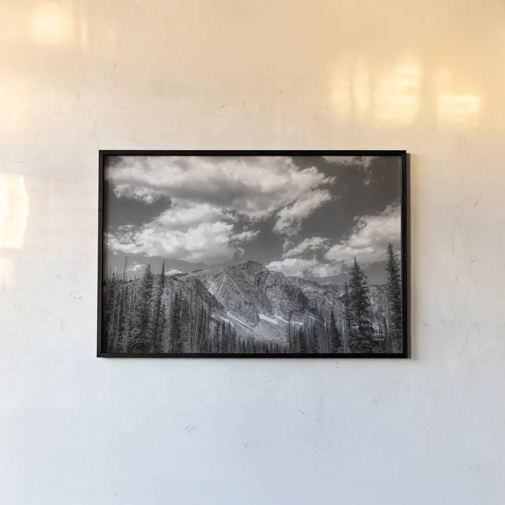Wyoming Blues by Nathan Larson. shown as a paper print in a black flame. Available as a archival giclee rolled canvas, fine art paper, or poster print. SKU 81751i.