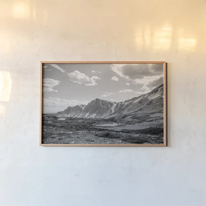 Wyoming Wonder by Nathan Larson. shown as a paper print in a natural frame. Available as a archival giclee rolled canvas, fine art paper, or poster print. SKU 81750i.