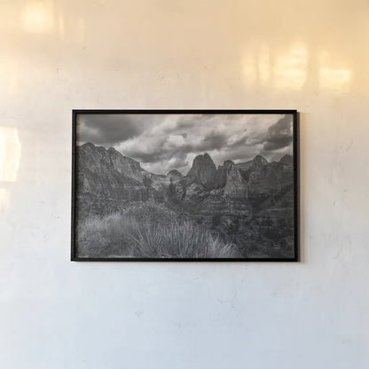 Zion National Park Storms BW by Nathan Larson. shown as a paper print in a black flame. Available as a archival giclee rolled canvas, fine art paper, or poster print. SKU 95630i.