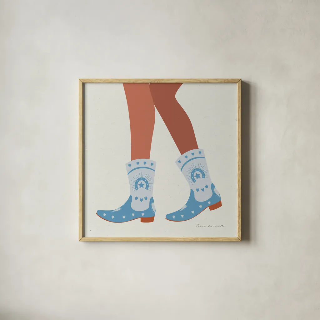 Cowgirly II Blue by Omar Escalante. Shown in a natural wood glass frame for a timeless modern aesthetic. Available as an archival giclee rolled canvas, fine art paper, or poster print. SKU 89334a.