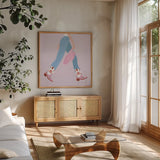 Cowgirly III by Omar Escalante. Shown in a natural wood frame in a cozy modern living room. Available as an archival giclee rolled canvas, fine art paper, or poster print. SKU 84595a.