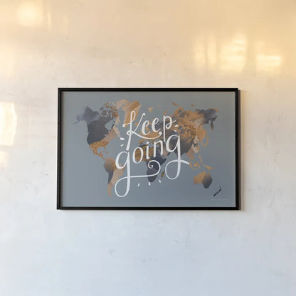 Keep Going World Map by Omar Escalante. shown as a paper print in a black flame. Available as a archival giclee rolled canvas, fine art paper, or poster print. SKU 70407i.