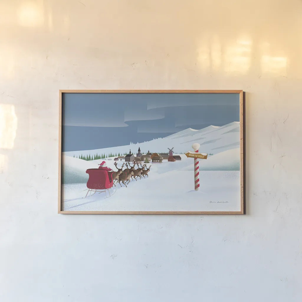 North Pole Christmas by Omar Escalante. shown as a paper print in a natural frame. Available as a archival giclee rolled canvas, fine art paper, or poster print. SKU 74907i.