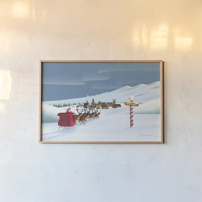 North Pole Christmas by Omar Escalante. shown as a paper print in a natural frame. Available as a archival giclee rolled canvas, fine art paper, or poster print. SKU 74907i.