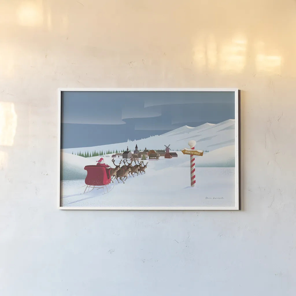 North Pole Christmas by Omar Escalante. shown as a paper print in a white frame. Available as a archival giclee rolled canvas, fine art paper, or poster print. SKU 74907i.