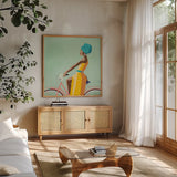 Summer Girl II v2 Texture by Omar Escalante. Shown in a natural wood frame in a cozy modern living room. Available as an archival giclee rolled canvas, fine art paper, or poster print. SKU 70077a.