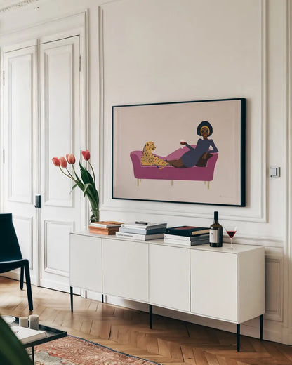 Wild Lounge I Pink Couch by Omar Escalante. shown as a framed stretched canvas in a living room above a console. Available as a archival giclee rolled canvas, fine art paper, or poster print. SKU 77083i.