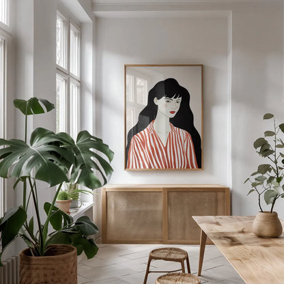 Woman in Striped Blouse I by Omar Escalante. shown as a print in a natural wood frame in a dining room. Available as a archival giclee rolled canvas, fine art paper, or poster print. SKU 98857h.
