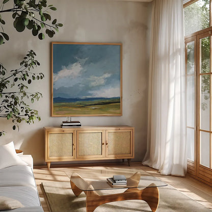August Storm by Pamela Munger. Shown in a natural wood frame in a cozy modern living room. Available as an archival giclee rolled canvas, fine art paper, or poster print. SKU 87854a.