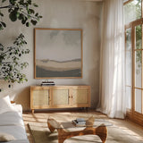 Hills Beyond Hills Neutral by Pamela Munger. Shown in a natural wood frame in a cozy modern living room. Available as an archival giclee rolled canvas, fine art paper, or poster print. SKU 73947a.