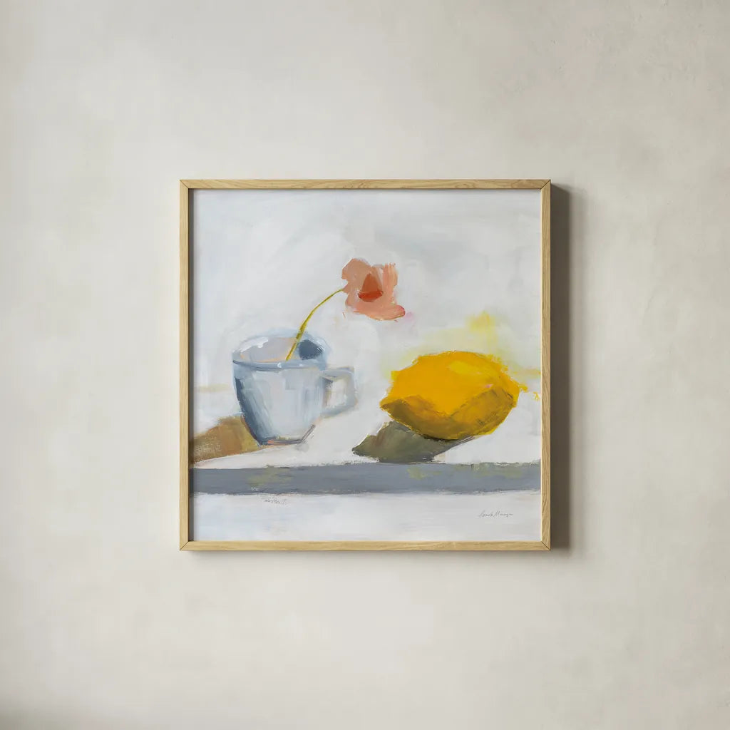 Lemon and Cup by Pamela Munger. Shown in a natural wood glass frame for a timeless modern aesthetic. Available as an archival giclee rolled canvas, fine art paper, or poster print. SKU 96979a.