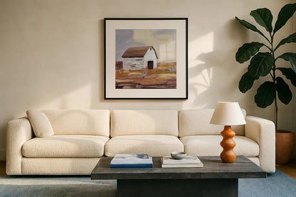 Little White Barn by Pamela Munger. Displayed in a glass frame with matte in a clean modern living room. Available as an archival giclee rolled canvas, fine art paper, or poster print. SKU 70681a.