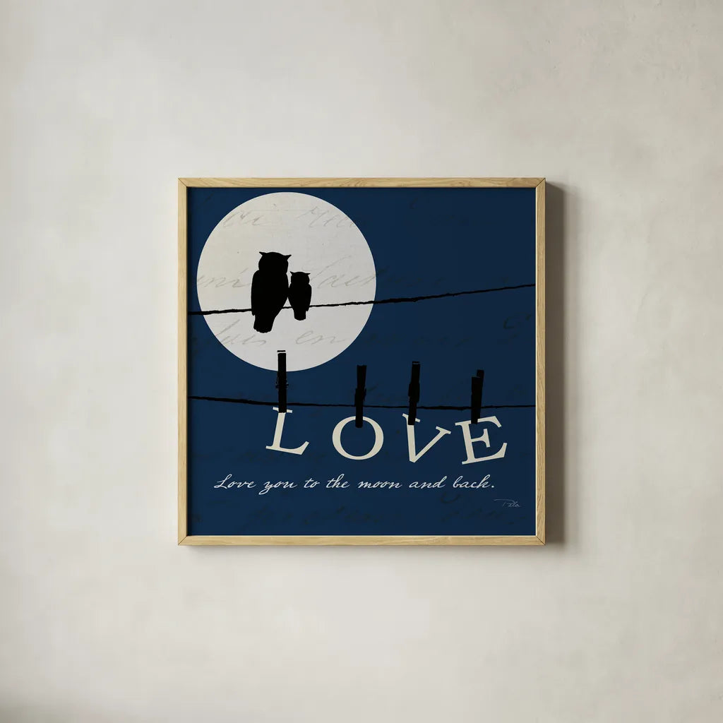 Moon Love I Indigo by Pela. Shown in a natural wood glass frame for a timeless modern aesthetic. Available as an archival giclee rolled canvas, fine art paper, or poster print. SKU 49854a.