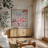 Bazaar Patchwork III by Pela Studio. Shown in a natural wood frame in a cozy modern living room. Available as an archival giclee rolled canvas, fine art paper, or poster print. SKU 48750a.