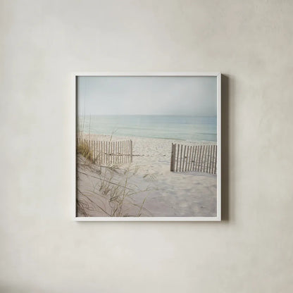 Beach Fence by Pela Studio. Shown in a crisp white glass frame for a clean and minimalist style. Available as an archival giclee rolled canvas, fine art paper, or poster print. SKU 76252a.