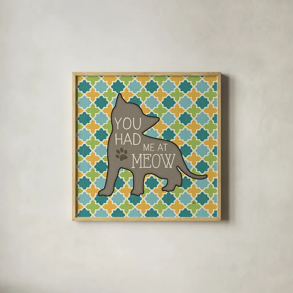 Cat Sayin II by Pela Studio. Shown in a natural wood glass frame for a timeless modern aesthetic. Available as an archival giclee rolled canvas, fine art paper, or poster print. SKU 14297a.