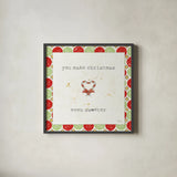 Christmas Cuties II Step 01A by Pela Studio. Shown in a sleek black glass frame for a contemporary gallery look. Available as an archival giclee rolled canvas, fine art paper, or poster print. SKU 47512a.