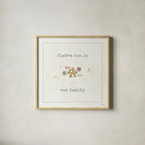 Christmas Cuties V - Flakes Run in Our Family by Pela Studio. Shown in a natural wood glass frame for a timeless modern aesthetic. Available as an archival giclee rolled canvas, fine art paper, or poster print. SKU 30848a.