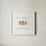 Christmas Cuties VI - Just be Naughty and Save Santa the Trip by Pela Studio. Shown in a crisp white glass frame for a clean and minimalist style. Available as an archival giclee rolled canvas, fine art paper, or poster print. SKU 30849a.