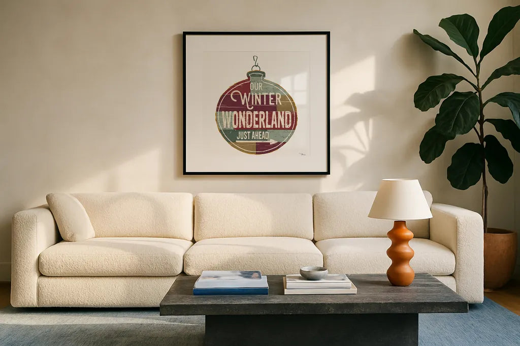 Christmas Signs II White by Pela Studio. Displayed in a glass frame with matte in a clean modern living room. Available as an archival giclee rolled canvas, fine art paper, or poster print. SKU 65492a.