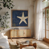 Coastal Moonlight I Teal by Pela Studio. Shown in a natural wood frame in a cozy modern living room. Available as an archival giclee rolled canvas, fine art paper, or poster print. SKU 11385a.