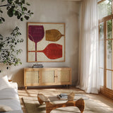 Colorful Wine II by Pela Studio. Shown in a natural wood frame in a cozy modern living room. Available as an archival giclee rolled canvas, fine art paper, or poster print. SKU 8205a.