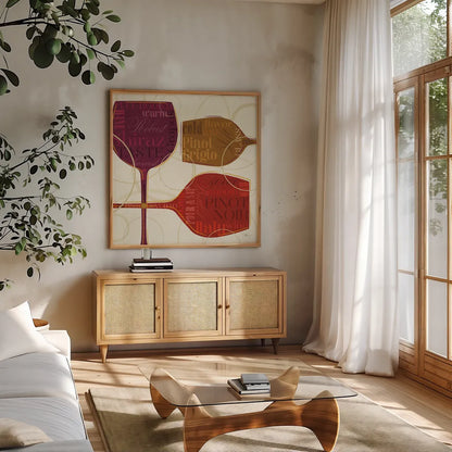 Colorful Wine II by Pela Studio. Shown in a natural wood frame in a cozy modern living room. Available as an archival giclee rolled canvas, fine art paper, or poster print. SKU 8205a.