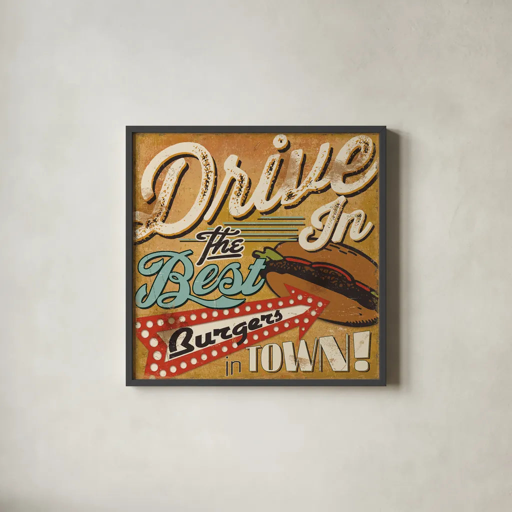 Diners and Drive Ins I by Pela Studio. Shown in a sleek black glass frame for a contemporary gallery look. Available as an archival giclee rolled canvas, fine art paper, or poster print. SKU 13128a.
